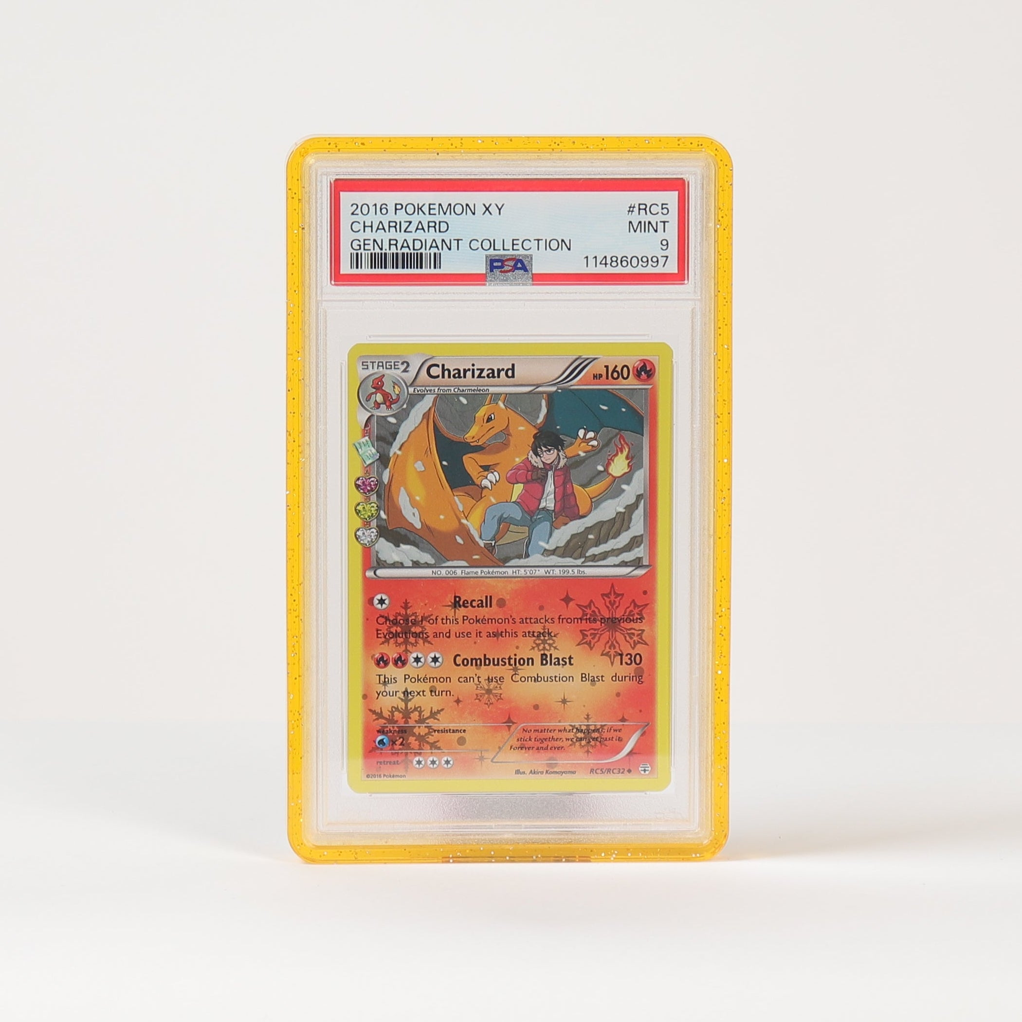 A graded Pokémon TCG card in a clear plastic slab with a yellow border, standing upright on a white surface against a white background.