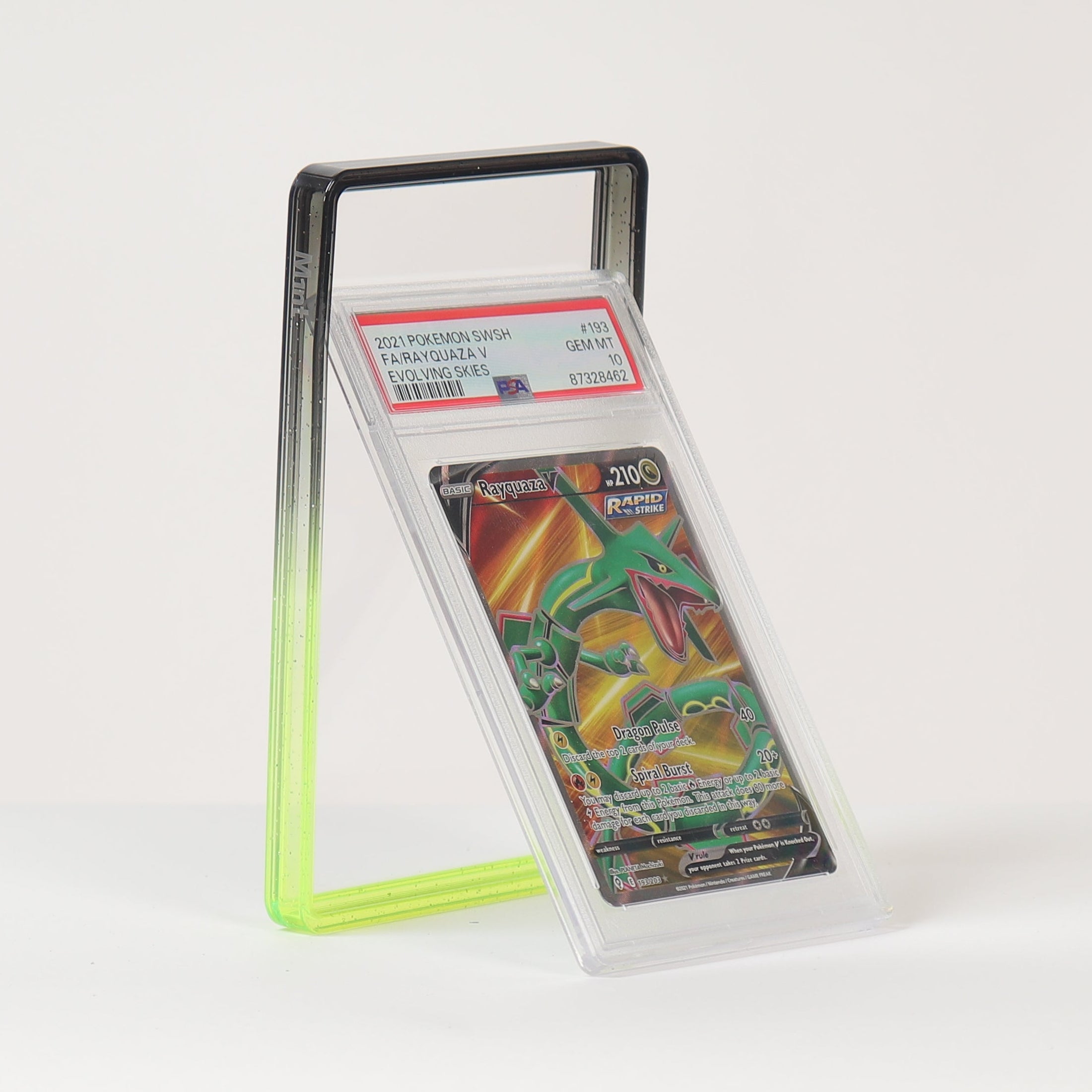 A graded collectible card in a clear plastic slab with a red grading label, displayed on a black and neon green metal stand against a clean white background.