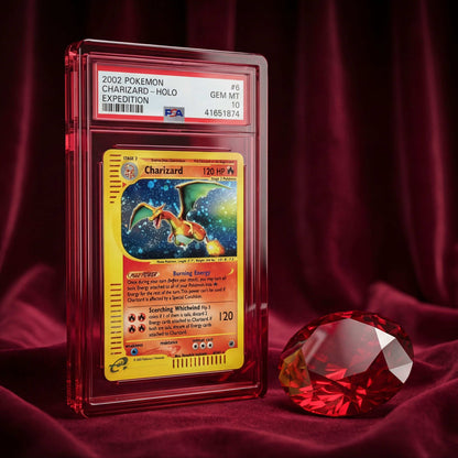 Pokémon trading card featuring Charizard with a red gemstone on a dark background
