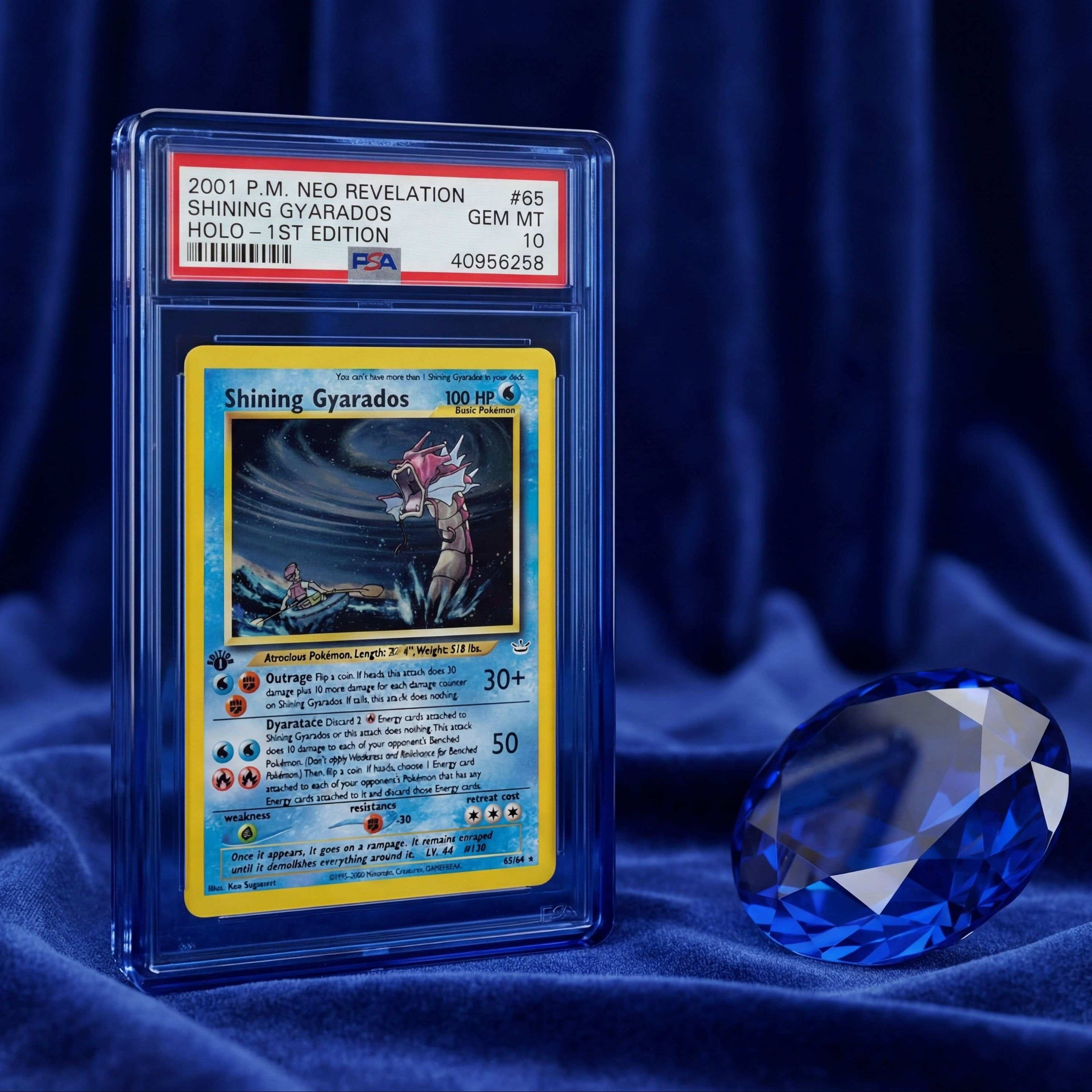 Trading card featuring Shining Gyarados with a blue gemstone on a dark blue fabric background