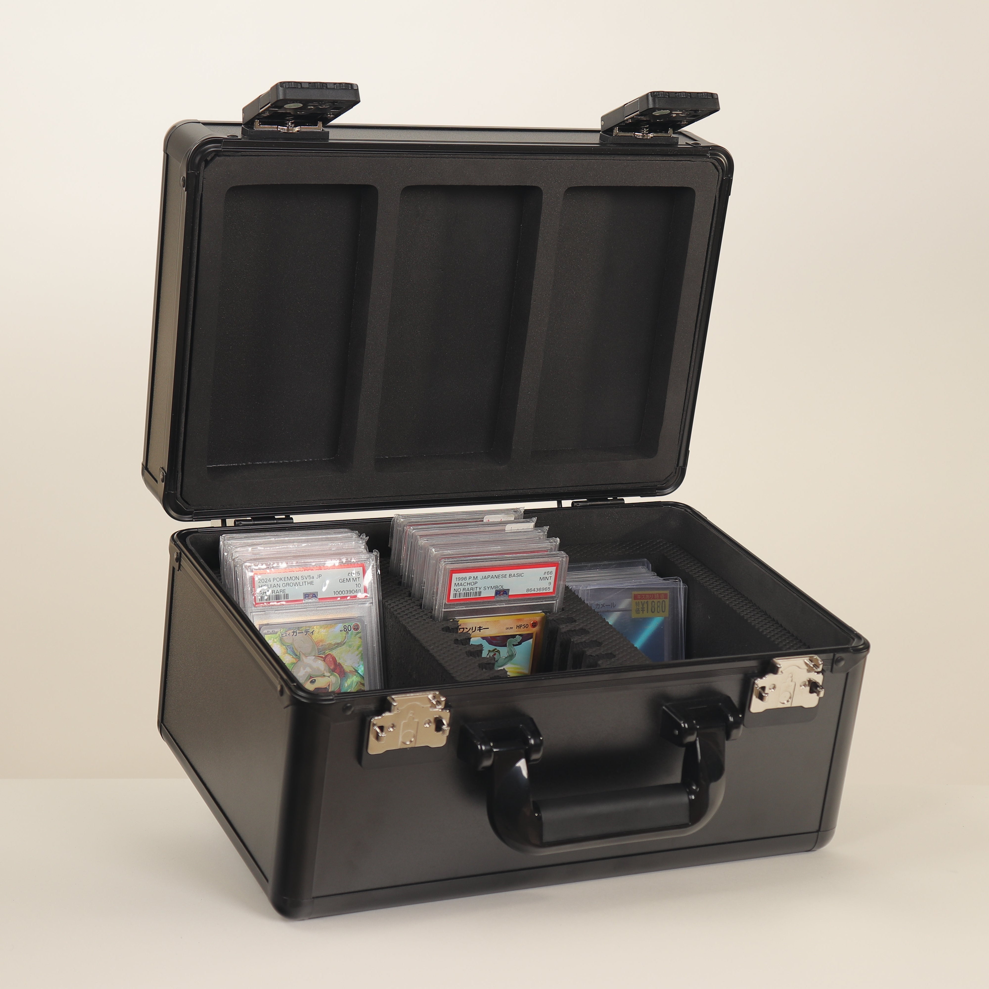 Black protective case with compartments on a beige background