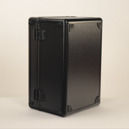 Black rectangular box on a beige background