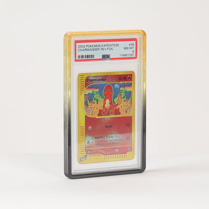 A graded holographic Pokémon TCG card, specifically a 2011 Charizard hologram, encapsulated in a PSA grading sleeve and standing upright on a white surface against a white background.